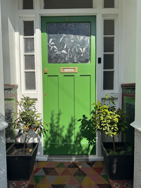 External door decorated in green in South Croydon